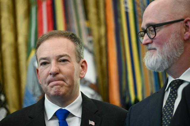 (L/R) EPA Administrator Lee Zeldin and Representative Derrick Van Orden, Republican from Wisconsin, listen as US President Donald Trump speaks during an announcement about coal, in the Oval Office of the White House in Washington, DC on June 4, 2026. President Trump on Thursday announced he was using Cold War era legislation to tap $700 million in funding for a slew of coal plants and mines and an export terminal. (Photo by Brendan SMIALOWSKI / AFP)