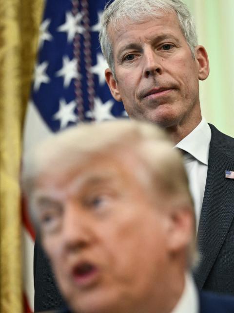 US Secretary of Energy Chris Wright looks on as President Donald Trump speaks during an announcement about coal, in the Oval Office of the White House in Washington, DC on June 4, 2026. President Trump on Thursday announced he was using Cold War era legislation to tap $700 million in funding for a slew of coal plants and mines and an export terminal. (Photo by Brendan SMIALOWSKI / AFP)