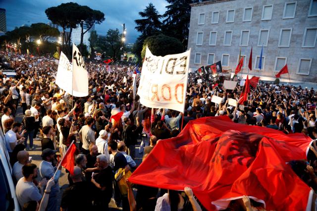Protestors gather in front of Albania's Prime Minister's Office during the 4th day of demonstration against the construction of a luxury resort near a protected natural area, in Tirana on June 4, 2026. Several thousand citizens demonstrated in Tirana for the second consecutive night to demand transparency around a tourist complex project allegedly linked to US President's son-in-law, Kushner. (Photo by AFP)
