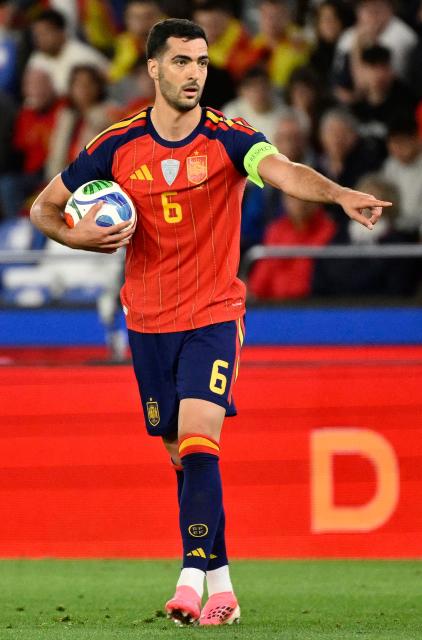 Spain's midfielder #06 Mikel Merino takes the ball during the international friendly football match between Spain and Iraq ahead of the 2026 FIFA World Cup football tournament, at the Riazor stadium in A Coruna, northern Spain, on June 4, 2026. (Photo by Ander Gillenea / AFP)