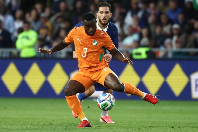 Ivory Coast's defender #03 Ghislain Konan controls the ball during the international friendly football match between France and Ivory Coast ahead of the 2026 FIFA World Cup football tournament at the Stade de la Beaujoire in Nantes, western France, on June 4, 2026. (Photo by FRANCK FIFE / AFP)