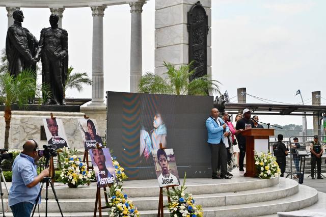 Ronny Medina (C), father of Steven Medina, speaks during a public apology event on behalf of the Ecuadorian government for the forced disappearance of the four children from the Malvinas, at the Rotonda hemicycle in Guayaquil, Ecuador, on June 4, 2026. (Photo by MARCOS PIN / AFP)