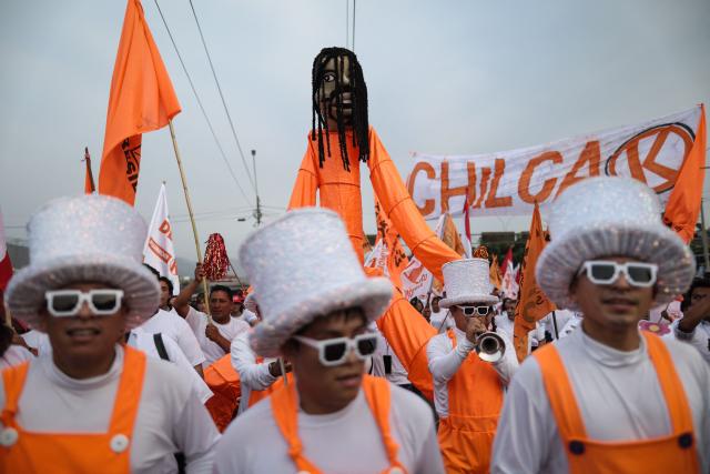 Supporters of Peru's presidential candidate for the Fuerza Popular party, Keiko Fujimori, walk while waiting for the start of her closing campaign rally in Lima on June 4, 2026. Right-wing candidate Keiko Fujimori and leftist Roberto Sanchez will face off in Peru's presidential runoff on June 7, 2026. (Photo by Anthony Nino de Guzman / AFP)