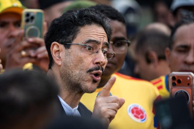 Colombia's presidential candidate for the Pacto Historico Party, Ivan Cepeda, gestrues as he speaks during a campaign rally with organized football fan supporters in Bogota on June 4, 2026. Colombia will hold the runoff presidential election on June 21. (Photo by AFP)