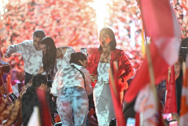 Peru's presidential candidate for the Fuerza Popular party, Keiko Fujimori, gestures during her closing campaign rally in Lima on June 4, 2026. Right-wing candidate Keiko Fujimori and leftist Roberto Sanchez will face off in Peru's presidential runoff on June 7, 2026. (Photo by MARTIN BERNETTI / AFP)