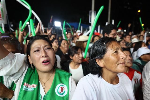 Supporters of Peru’s presidential candidate for the Juntos por el Peru party, Roberto Sanchez, react during his closing campaign rally in Lima on June 4, 2026. Right-wing candidate Keiko Fujimori and leftist Roberto Sanchez will face off in Peru's presidential runoff on June 7, 2026. (Photo by Connie FRANCE / AFP)