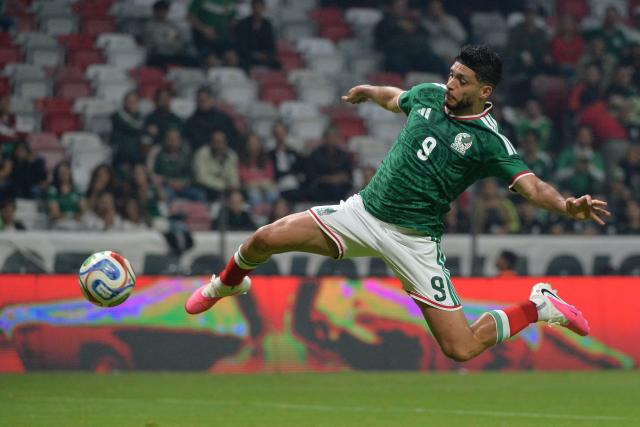 Mexico's forward #09 Raul Jimenez jumps for the ball during the international friendly football match between Mexico and Serbia at the Nemesio Diez Stadium in Toluca, Mexico on June 4, 2026. (Photo by Mario Vazquez / AFP)