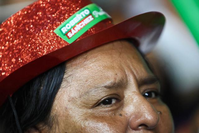 A supporter of Peru’s presidential candidate for the Juntos por el Peru party, Roberto Sanchez, reacts during his closing campaign rally in Lima on June 4, 2026. Right-wing candidate Keiko Fujimori and leftist Roberto Sanchez will face off in Peru's presidential runoff on June 7, 2026. (Photo by Connie FRANCE / AFP)