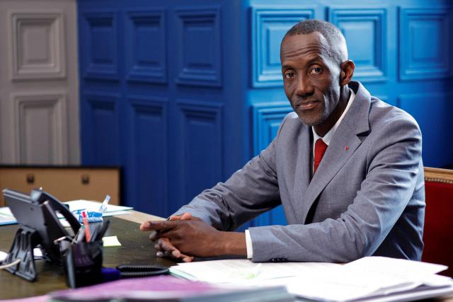 (FILES) La France Insoumise (LFI) Saint-Denis Mayor Bally Bagayoko poses during a photo session following an interview with AFP at the city hall in Saint-Denis, northern suburb of Paris on April 1, 2026. The revelation of the recent local elections, new mayor of Saint-Denis, Bally Bagayoko has quickly established himself as a leading figure of French left-wing party La France Insoumise (LFI). So much so that Melenchon's first campaign rally will be held on June 7, 2026, outside the Saint-Denis town hall and the royal basilica. (Photo by GEOFFROY VAN DER HASSELT / AFP)