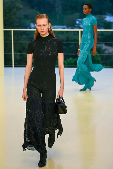 Models walk the runway during The Second Chapter of Hermes Women’s Ready-to-Wear Fall-Winter 2026 fashion show at Hotel Bel-Air in Los Angeles on June 4, 2026. (Photo by Patrick T. Fallon / AFP)