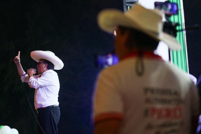 Peru's presidential candidate for the Juntos por el Peru party, Roberto Sanchez, gestures as he speaks to supporters during his closing campaign rally in Lima on June 4, 2026. Right-wing candidate Keiko Fujimori and leftist Roberto Sanchez will face off in Peru's presidential runoff on June 7, 2026. (Photo by Connie FRANCE / AFP)