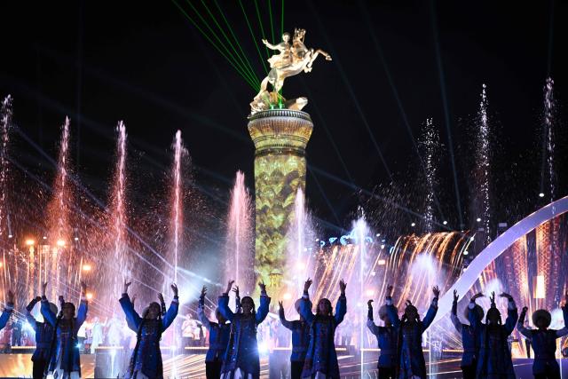 (FILES) Artists perform during a festive concert in the newly inaugurated city of Arkadag - named in honour of Turkmenistan's former leader Gurbanguly Berdymukhamedov - in Arkadag, some 30 kilometres (18 miles) outside the capital Ashgabat, on June 29, 2023. (Photo by Natalia KOLESNIKOVA / AFP)