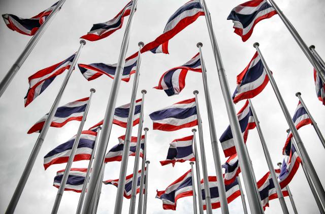 Thai national flags are displayed outside the Queen Sirikit National Convention Center in Bangkok on June 4, 2026. (Photo by Amaury PAUL / AFP)