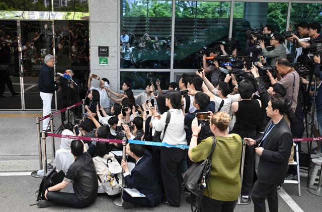 Nvidia CEO Jensen Huang speaks to reporters as he arrives at Gimpo airport in Seoul on June 5, 2026. (Photo by Jung Yeon-je / AFP)
