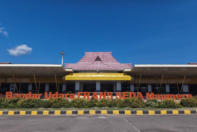 A sign of the Fransiskus Xaverius Seda Airport is seen after the airport was closed due to volcanic ash from the eruption of Mount Lewotobi Laki-laki in Maumere, East Nusa Tenggara, on June 5, 2026. A highly active volcano in eastern Indonesia erupted several times on June 5, spewing towering ash columns into the sky and forcing a local airport to close, authorities said. Mount Lewotobi Laki-Laki on Flores Island erupted at 11:15 am (0315 GMT), sending volcanic material 2.5 kilometres (1.6 miles) into the air, the national volcanology agency said in a statement. (Photo by Arnold Welianto / AFP)