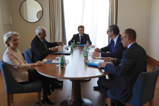 (LtoR) European Commission President Ursula von der Leyen, European Council President Antonio Costa, French President Emmanuel Macron, Serbian President Aleksandar Vucic and German Chancellor Friedrich Merz pose prior to a meeting as part of the EU-Western Balkans Summit at Porto Montenegro in Tivat on June 5, 2026. (Photo by Ludovic MARIN / AFP)