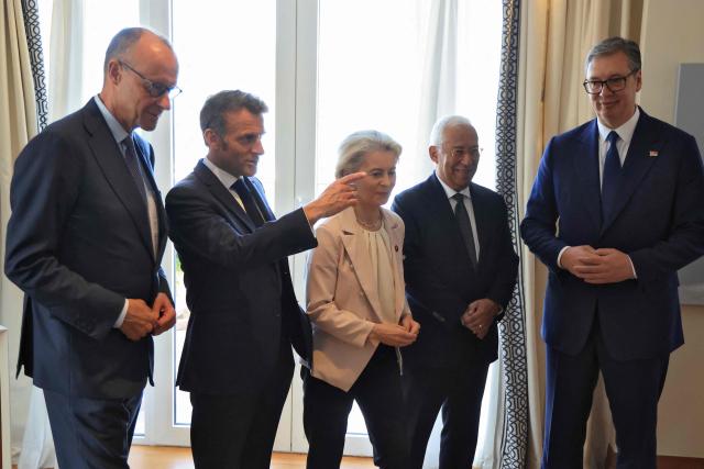 (LtoR) German Chancellor Friedrich Merz, French President Emmanuel Macron, European Commission President Ursula von der Leyen, European Council President Antonio Costa and Serbian President Aleksandar Vucic pose ahead of a meeint as part of the EU-Western Balkans Summit at Porto Montenegro in Tivat on June 5, 2026. (Photo by Ludovic MARIN / AFP)