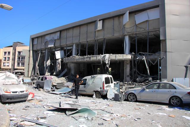 A man inspects the aftermath at the site of an Israeli strike that hit the previous day in the southern Lebanese coastal city of Tyre on June 5, 2026. Israeli strikes overnight in the south Lebanon city of Tyre killed seven people, a source from Lebanon's civil defence told AFP on June 5, despite a ceasefire in the Israel-Hezbollah war. (Photo by Kawnat HAJU / AFP)