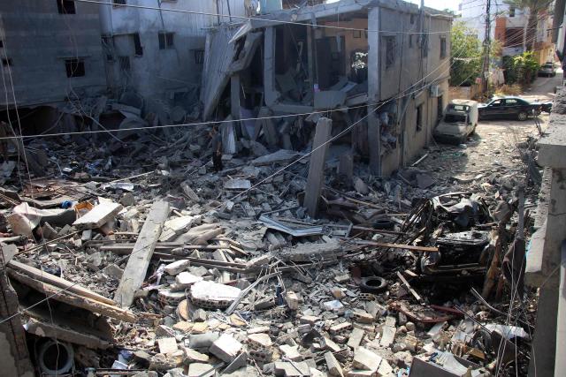 A man inspects the aftermath at the site of an Israeli strike that hit the previous day in the southern Lebanese coastal city of Tyre on June 5, 2026. Israeli strikes overnight in the south Lebanon city of Tyre killed seven people, a source from Lebanon's civil defence told AFP on June 5, despite a ceasefire in the Israel-Hezbollah war. (Photo by Kawnat HAJU / AFP)