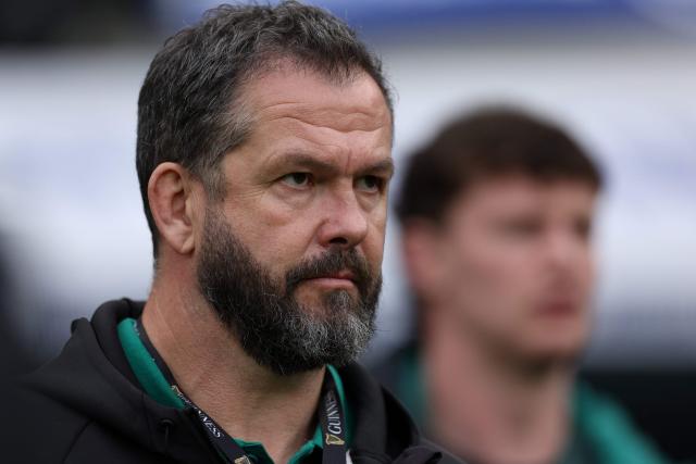 (FILES) Ireland's coach Andy Farrell (L) watches the end of the Six Nations international rugby union match between England and Ireland at Allianz Stadium, Twickenham, in south-west London, on February 21, 2026. Ireland head coach Andy Farrell has signed a contract extension that will take him to the end of the 2031 Rugby World Cup, the Irish Rugby Football Union announced on June 5. (Photo by Adrian Dennis / AFP)