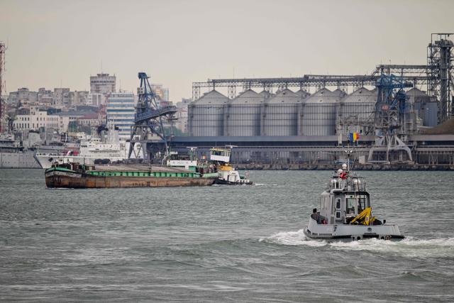 Picture taken on May 18, 2026 shows ships at the entrance to the port of Constanta, Romania. A sea drone exploded early Friday, June 5, 2026 in Romania's Black Sea port of Constanta without causing casualties, a week after an aerial drone crashed into an apartment building in the country, injuring two. (Photo by Daniel MIHAILESCU / AFP)