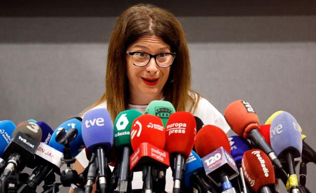 (FILES) Former Spanish Socialist Party (PSOE) member member Leire Diez speaks during a press conference in Madrid, on June 4, 2025. The multiplication of revelations about a cell responsible within the Spanish Socialist Party (PSOE) to try to interfere in investigations targeting the political party increases the pressure on Spain's Prime Minister and his government. Diez submitted her resignation from the PSOE after leaked audio recordings in which she is heard attempting to maneuver high-ranking public officials. (Photo by Thomas COEX / AFP)