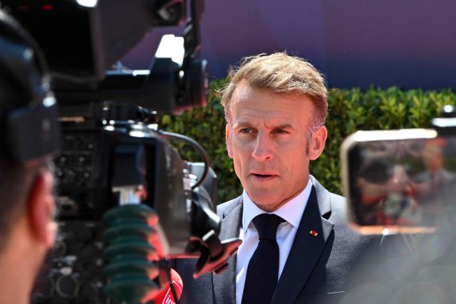 France's President Emmanuel Macron makes a press statement upon his arrival ahead of the EU-Western Balkans Summit at Porto Montenegro in Tivat on June 5, 2026. (Photo by Elvis BARUKCIC / AFP)