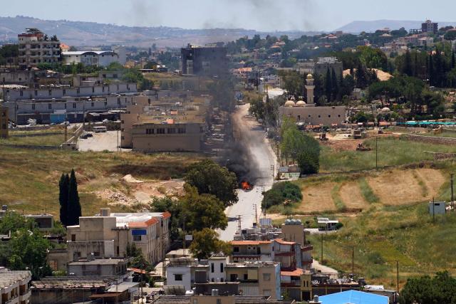 Smoke rises from a vehcile targeted by an Israeli drone attack in the southern Lebanese city of Nabatieh on June 5, 2026. Israeli strikes overnight in the south Lebanon city of Tyre killed seven people, a source from Lebanon's civil defence told AFP on June 5, despite a ceasefire in the Israel-Hezbollah war. (Photo by Abbas Fakih / AFP)