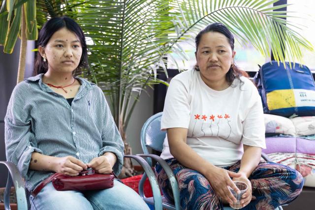 Mountaineer Dawa Sherpa's wife Damu Sherpa (R) and daughter Mendo Lhamu Sherpa (L) wait outside the intensive care unit (ICU) at HAMS Hospital in Kathmandu on June 5, 2026. The family of a Nepali climber who dragged himself off Mount Everest six days after being abandoned called for an investigation into rescue efforts, as doctors said on June 5 he is in a stable condition and recovering in hospital. Mountaineer Dawa Sherpa, 57, vanished in bitter conditions on the upper reaches of the world's highest mountain early on May 30. His family thought he was dead, and had even begun ritual mourning prayers. (Photo by PRABIN RANABHAT / AFP)