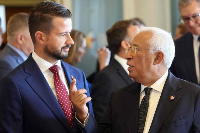 Montenegrin President Jakov Milatovic (L) and European Council President Antonio Costa (R) speak ahead of the EU-Western Balkans Summit at Porto Montenegro in Tivat on June 5, 2026. The summit brings together leaders from EU member states and the six Western Balkans partners to discuss enlargement and gradual integration into the EU single market. (Photo by Ludovic MARIN / AFP)