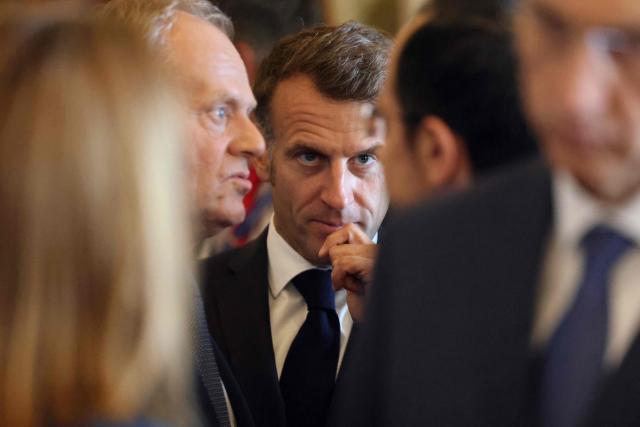 France's President Emmanuel Macron speaks head of states ahead of the EU-Western Balkans Summit at Porto Montenegro in Tivat on June 5, 2026. The summit brings together leaders from EU member states and the six Western Balkans partners to discuss enlargement and gradual integration into the EU single market. (Photo by Ludovic MARIN / AFP)