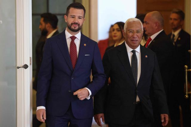 European Council President Antonio Costa (R) and Montenegrin President Jakov Milatovic arrive to chair the EU-Western Balkans Summit at Porto Montenegro in Tivat on June 5, 2026. The summit brings together leaders from EU member states and the six Western Balkans partners to discuss enlargement and gradual integration into the EU single market. (Photo by Ludovic MARIN / AFP)