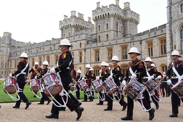 A military band arrives for a ceremony for the presentation of New Colours to the 40, 42, 43 and 45 Commando Royal Marines, at Windsor Castle, June 5, 2026. (Photo by Aaron Chown / POOL / AFP)