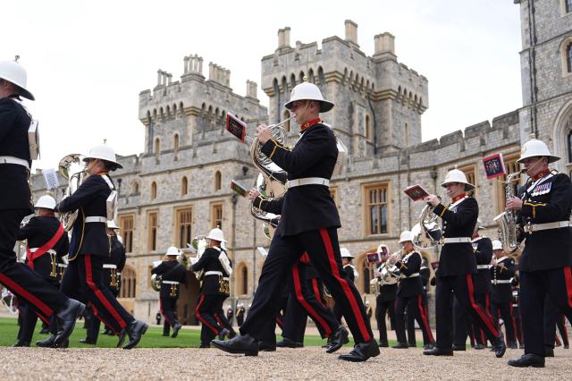 A military band arrives for a ceremony for the presentation of New Colours to the 40, 42, 43 and 45 Commando Royal Marines, at Windsor Castle, June 5, 2026. (Photo by Aaron Chown / POOL / AFP)