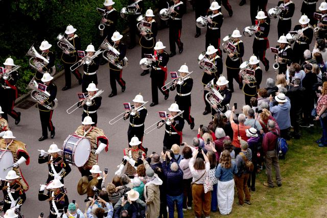 The Band of the Royal Marines performs ahead of a ceremony for the presentation of New Colours to the 40, 42, 43 and 45 Commando Royal Marines, at Windsor Castle, June 5, 2026. (Photo by Jordan Pettitt / POOL / AFP)