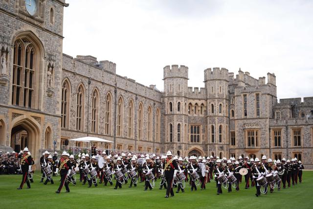 A military band arrives for a ceremony for the presentation of New Colours to the 40, 42, 43 and 45 Commando Royal Marines, at Windsor Castle, June 5, 2026. (Photo by Aaron Chown / POOL / AFP)