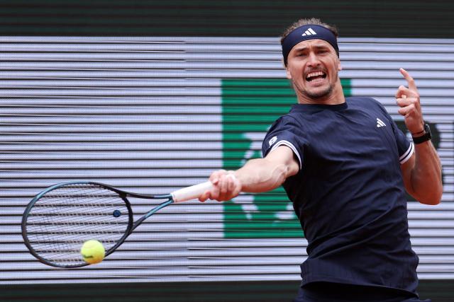 Germany's Alexander Zverev plays a forehand return to Czech Republic's Jakub Mensik during their men's semi final singles match on day 13 of the French Open tennis tournament on Court Philippe-Chatrier at the Roland-Garros Complex in Paris on June 5, 2026. (Photo by Alain JOCARD / AFP)