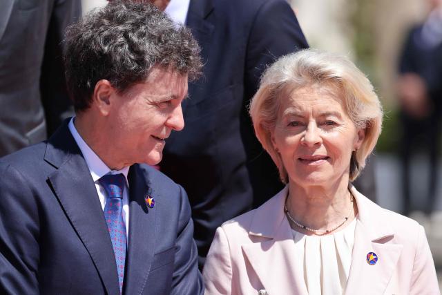 Romanian President Nicusor Dan (L) and European Commission President Ursula von der Leyen (R) speak after posing for a family picture as part of the EU-Western Balkans Summit at Porto Montenegro in Tivat on June 5, 2026. The summit brings together leaders from EU member states and the six Western Balkans partners to discuss enlargement and gradual integration into the EU single market. (Photo by Ludovic MARIN / AFP)