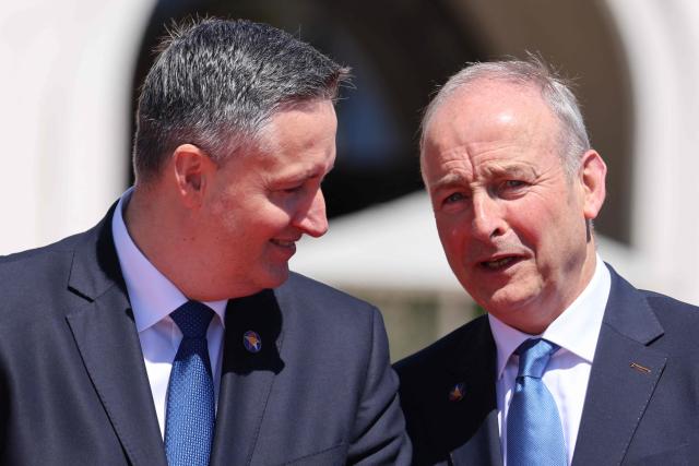 Chairman of the Presidency of Bosnia and Herzegovina Denis Becirovic (L) and Irish Prime Minister Micheal Martin (R) speak after posing for a family picture as part of the EU-Western Balkans Summit at Porto Montenegro in Tivat on June 5, 2026. The summit brings together leaders from EU member states and the six Western Balkans partners to discuss enlargement and gradual integration into the EU single market. (Photo by Ludovic MARIN / AFP)