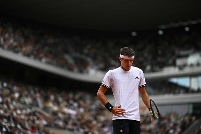 Czech Republic's Jakub Mensik looks on as he plays against Germany's Alexander Zverev during their men's semi final singles match on day 13 of the French Open tennis tournament on Court Philippe-Chatrier at the Roland-Garros Complex in Paris on June 5, 2026. (Photo by JULIEN DE ROSA / AFP)