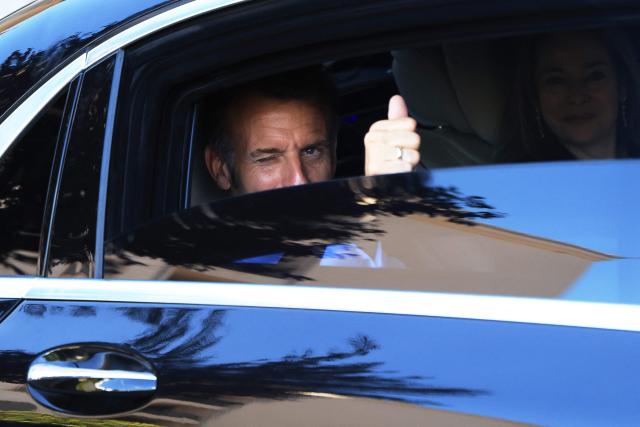 France's President Emmanuel Macron gestures as he leaves after an EU-Western Balkans Summit at Porto Montenegro in Tivat on June 5, 2026. (Photo by Ludovic MARIN / AFP)