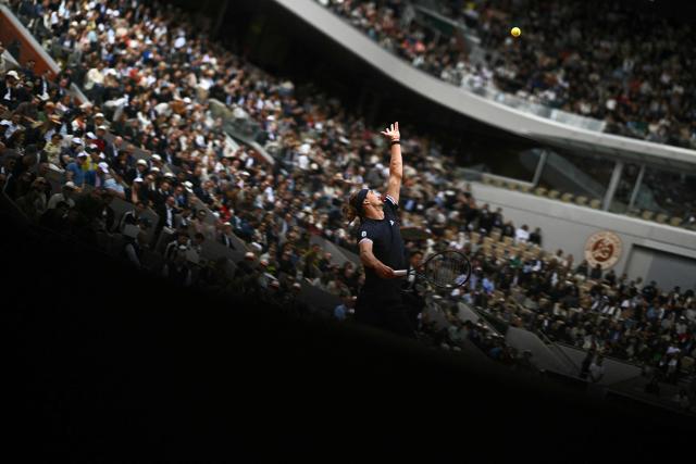 Germany's Alexander Zverev serves to Czech Republic's Jakub Mensik during their men's semi final singles match on day 13 of the French Open tennis tournament on Court Philippe-Chatrier at the Roland-Garros Complex in Paris on June 5, 2026. (Photo by JULIEN DE ROSA / AFP)