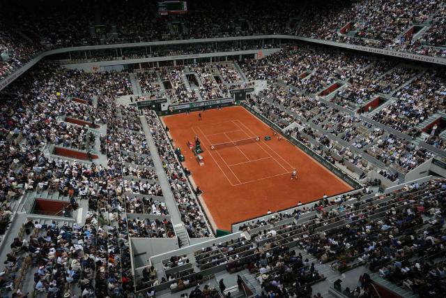 Czech Republic's Jakub Mensik serves to Germany's Alexander Zverev during their men's semi final singles match on day 13 of the French Open tennis tournament on Court Philippe-Chatrier at the Roland-Garros Complex in Paris on June 5, 2026. (Photo by Dimitar DILKOFF / AFP)