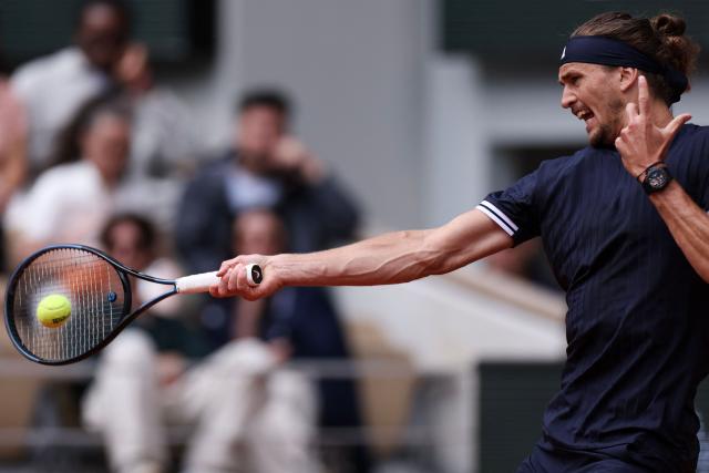 Germany's Alexander Zverev plays a forehand return to Czech Republic's Jakub Mensik during their men's semi final singles match on day 13 of the French Open tennis tournament on Court Philippe-Chatrier at the Roland-Garros Complex in Paris on June 5, 2026. (Photo by Alain JOCARD / AFP)