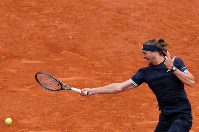 Germany's Alexander Zverev plays a forehand return to Czech Republic's Jakub Mensik during their men's semi final singles match on day 13 of the French Open tennis tournament on Court Philippe-Chatrier at the Roland-Garros Complex in Paris on June 5, 2026. (Photo by Thomas SAMSON / AFP)