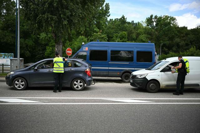 French gendarmes stop motorists as part of searches for information concerning the vehicle of suspect Jerome B after Lyhanna, an 11-year-old schoolgirl, went missing since May 29, 2026, in Fleurance, southwestern France, on June 5, 2026. France's government was on June 5 assessing possible judicial failings, after allegations investigators could have prevented a 11-year-old girl's disappearance by better dealing with previous sexual abuse complaints. Jerome B, a 41-year-old father of two, whose daughter was a school friend of Lyhanna, has been detained as the key suspect. (Photo by Lionel BONAVENTURE / AFP)
