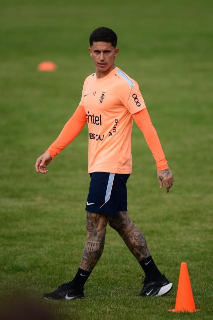 Uruguay's forward Brian Rodriguez takes part in a farewell activity with children ahead of the departure of the sqad for the FIFA World Cup 2026, at the Tito LOpez Lopez stadium in Pando, Canelones department, Uruguay on June 5, 2026. (Photo by Dante FERNANDEZ / AFP)