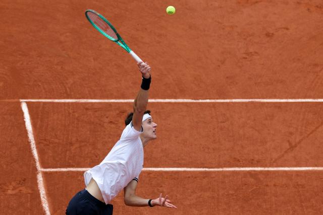 Czech Republic's Jakub Mensik serves to Germany's Alexander Zverev during their men's semi final singles match on day 13 of the French Open tennis tournament on Court Philippe-Chatrier at the Roland-Garros Complex in Paris on June 5, 2026. (Photo by Thomas SAMSON / AFP)