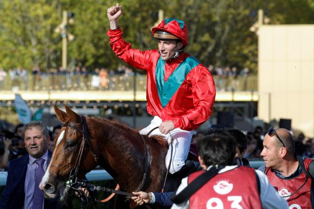 (FILES) French jockey Pierre-Charles Boudot (C) celebrates his victory after winning on "Waldgeist" during the 2019 Prix de l'Arc de Triomphe flat race at the ParisLongchamp race track in Paris on October 6, 2019. The case against the famous French jockey Pierre-Charles Boudot, who had been brought before the courts in late 2025 over an alleged rape in 2021, has been dismissed, AFP learned on June 5, 2026, from his lawyer and the Amiens Public Prosecutors Office. The multi-titled jockey had been placed under investigation in 2021 following a complaint by a young woman accusing him of raping her in Cagnes-sur-Mer (Alpes-Maritimes) on the fringes of a horse racing meeting. (Photo by GEOFFROY VAN DER HASSELT / AFP)