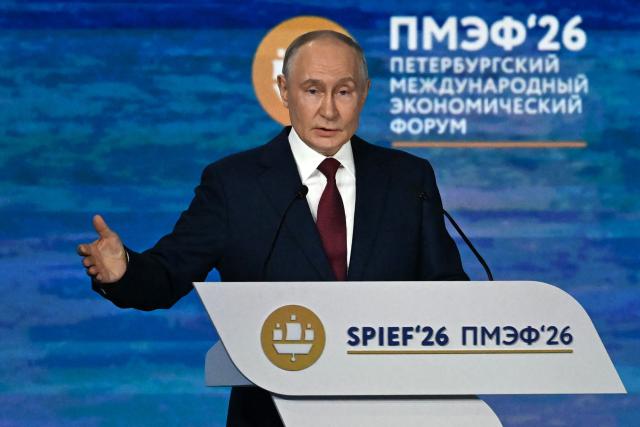 Russian President Vladimir Putin delivers a speech during the plenary session of the St. Petersburg International Economic Forum (SPIEF) in Saint Petersburg on June 5, 2026. (Photo by OLGA MALTSEVA / AFP)